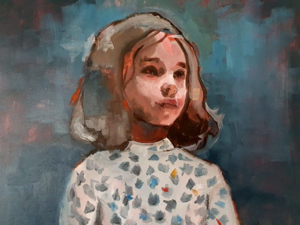 Young Girl in Blue Dotted Jumper